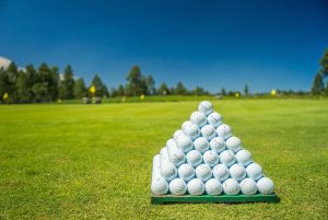 Close up of  golf balls in shape of pyramid | Madison, VA