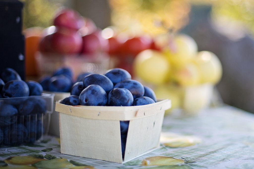 close up shot of a small basket of fresh grapes at a farmers market near Madison VA