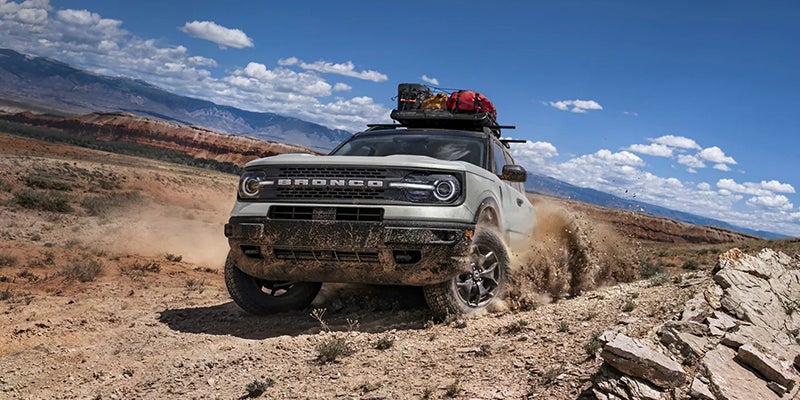 brand new 2023 Ford Bronco Sport having some fun kicking up dirt off road.